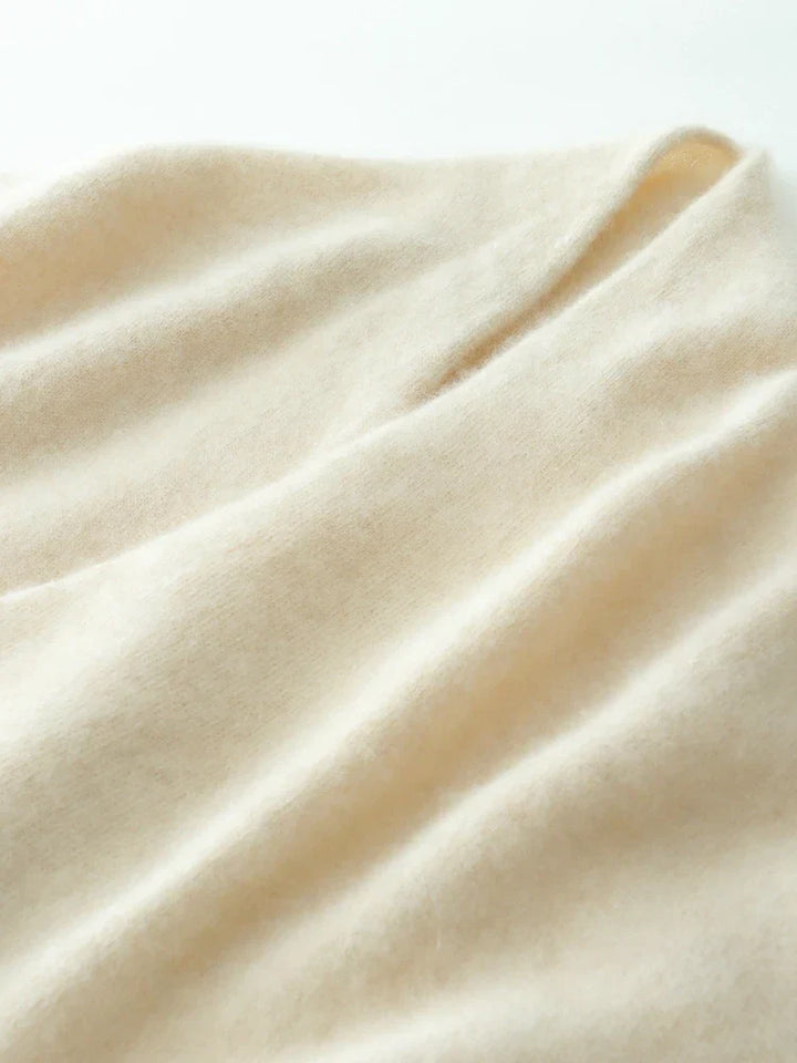 Cozy and elegant women's sweater with a crossover neckline, made from luxurious cashmere knit