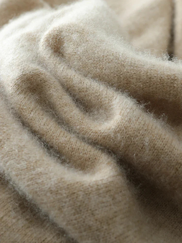 Professional product photography of Women's Luxe Cashmere Knit Crossover Sweater, highlighting texture