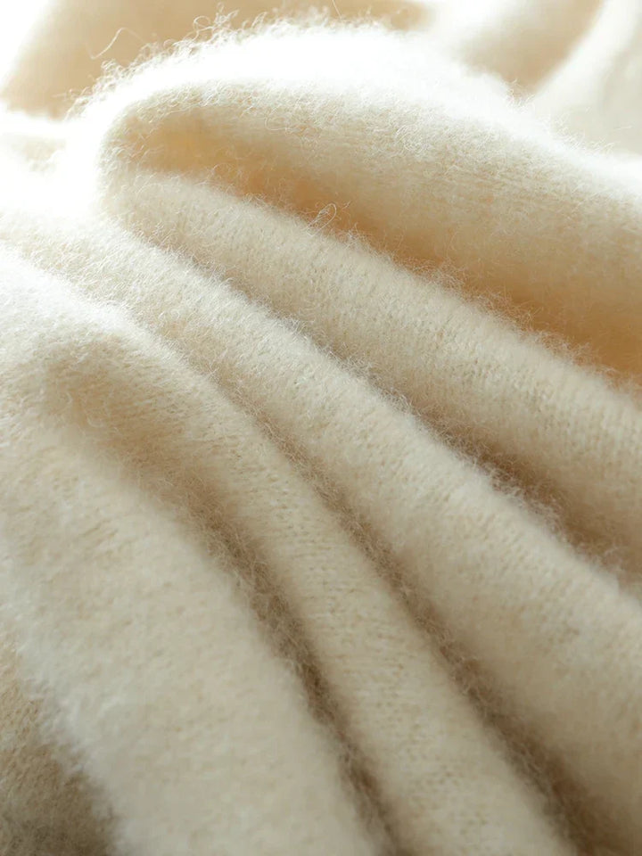 Women's soft knit sweater, featuring a beautiful crossover design in luxurious cashmere for elegance