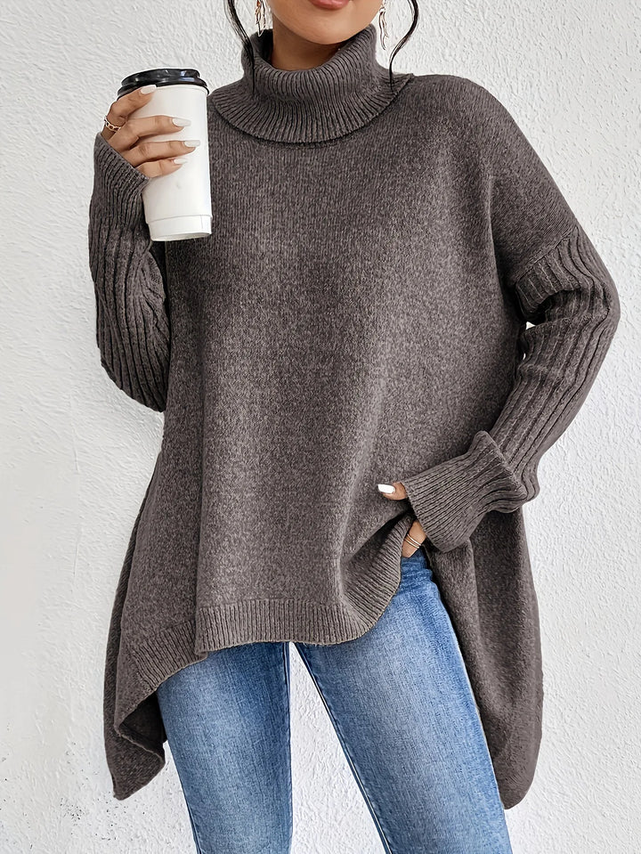Model wearing a women's dark green cashmere turtleneck sweater, stylish and warm winter fashion