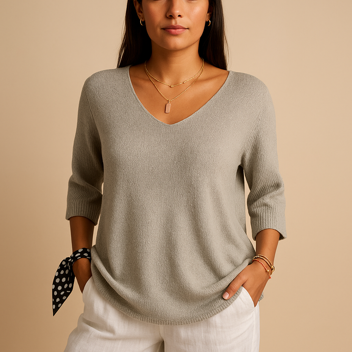 Chic women's fashion blouse with modern design, versatile for daily wear, elegant & loose fit.