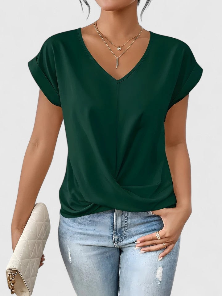 Elegant long sleeve women's V-neck top with a unique twist front detail, perfect for casual fashion.