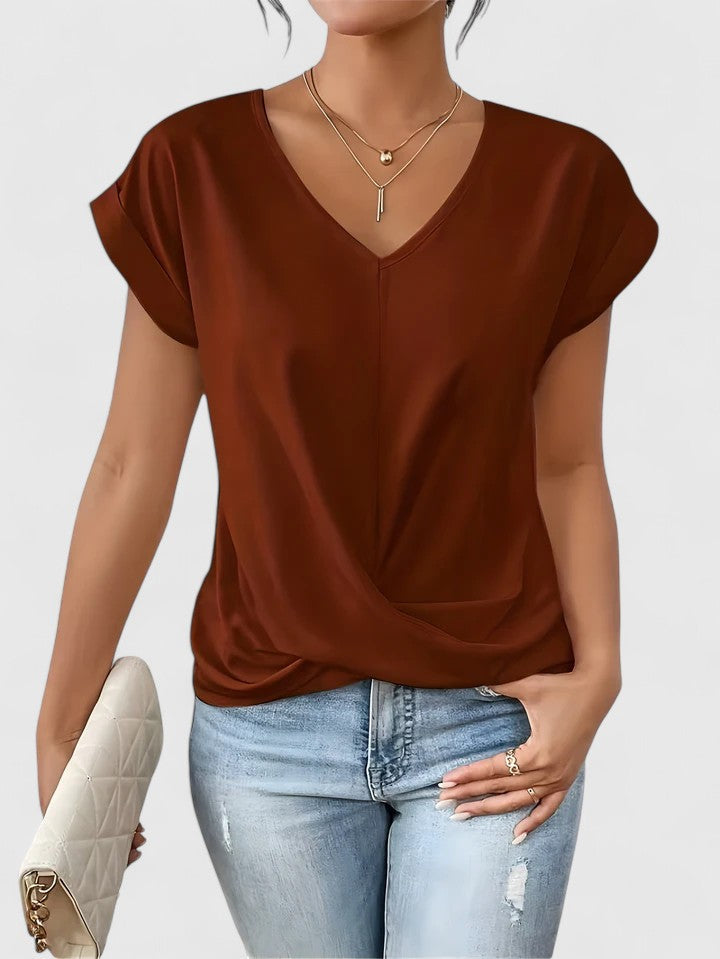 Stylish women's apparel: Mahrianne V-neck twist front long sleeve top for effortless style.
