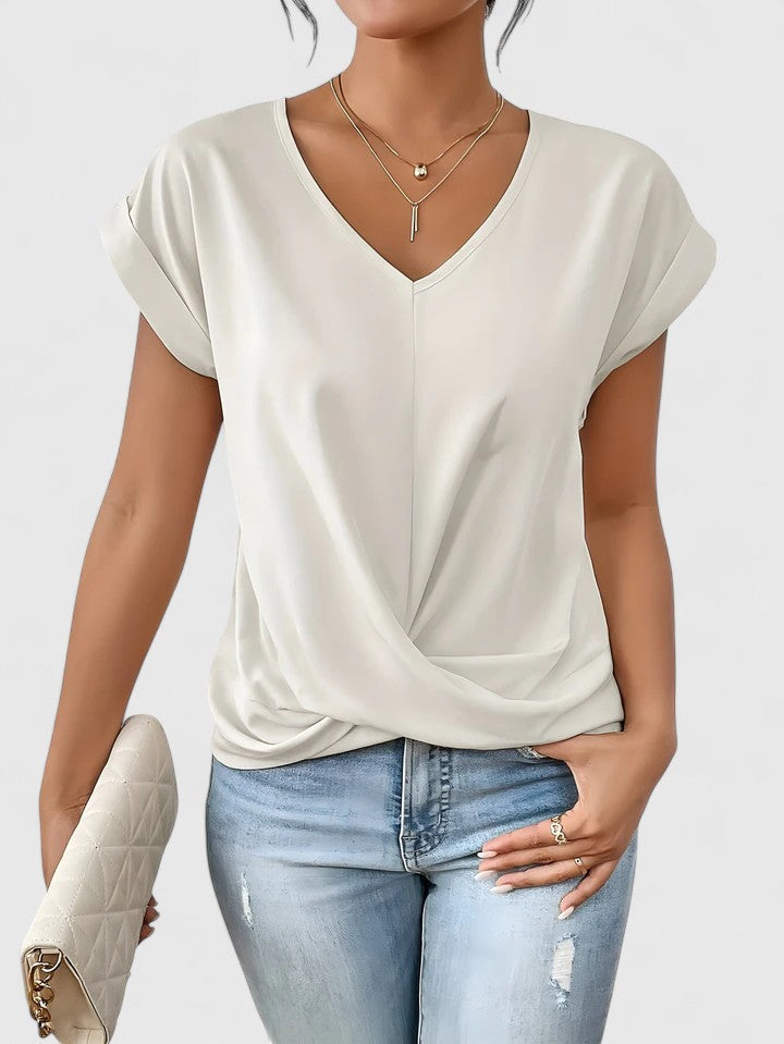 Fashionable women's long sleeve top with an elegant twist front and deep V-neck for versatile styling.