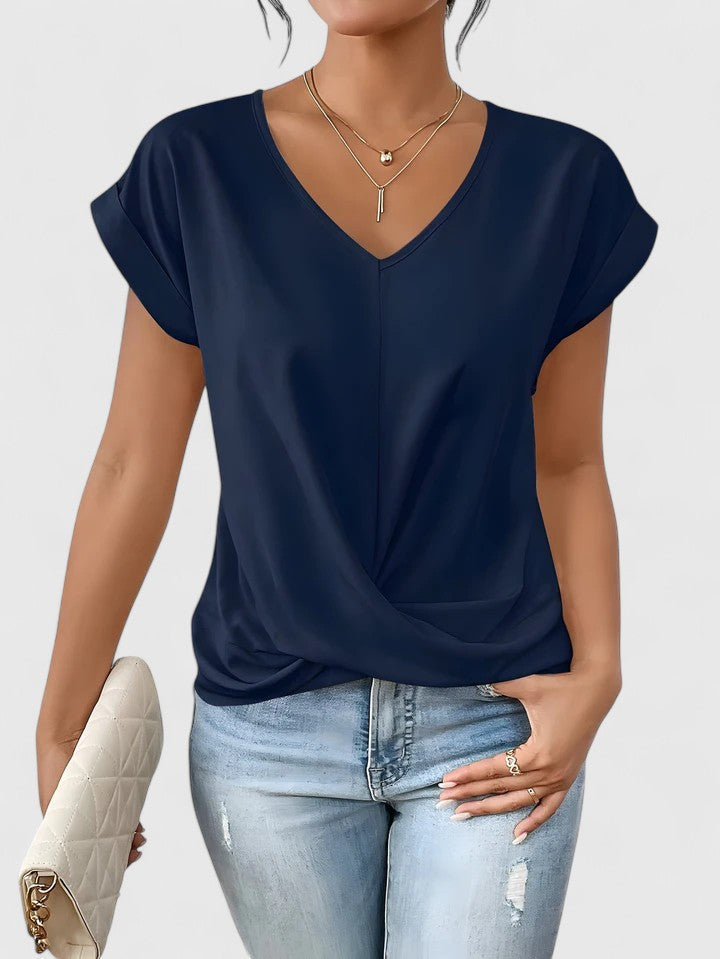 Effortless everyday wear: Mahrianne women's V-neck top, featuring a stylish twist front detail.