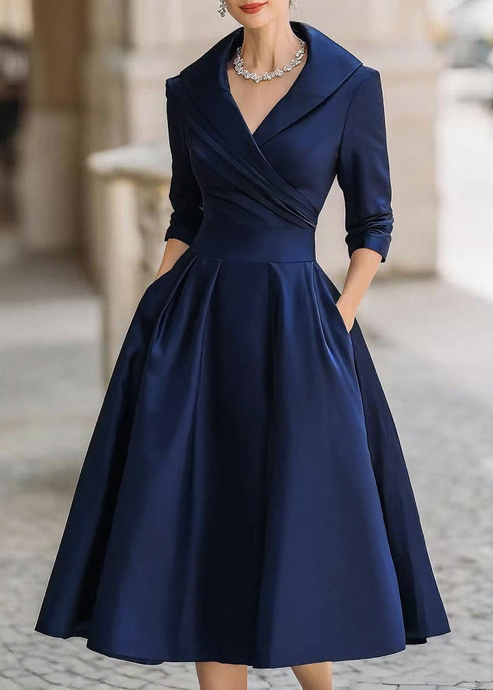 Chic A-line women's midi dress, sophisticated draped collar, practical pockets. Ideal for formal events.