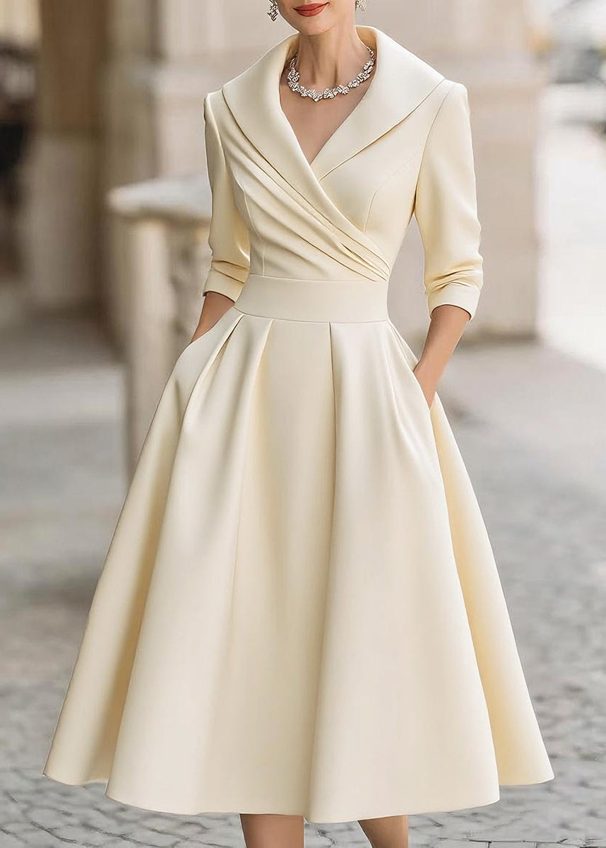 Timeless women's midi dress. Draped collar, A-line cut & practical pockets for an elegant, sophisticated look.