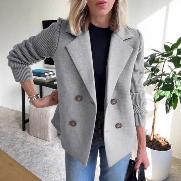 Front view of a women's cream knit blazer, comfortable sweater jacket for casual chic style.
