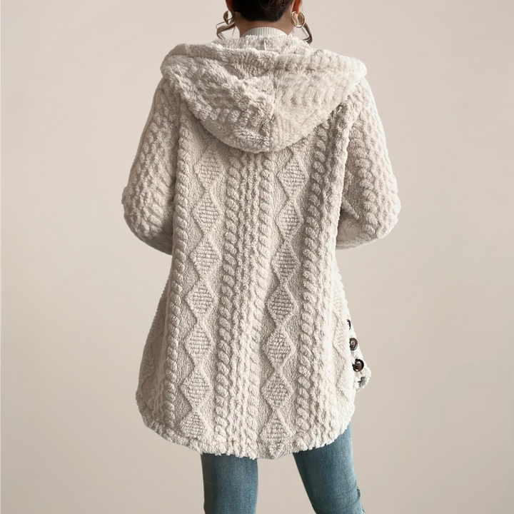 Stylish woman wearing a comfortable hooded cardigan, versatile for everyday spring outfits
