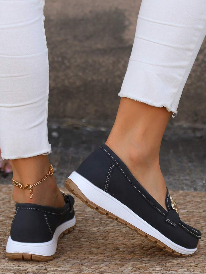Tan women's non-slip orthopedic loafers, providing all-day comfort & style.