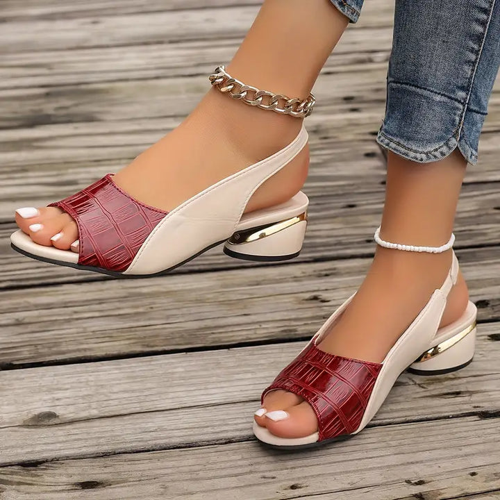 Elegant women's open toe slingback sandals with a block heel, perfect for dressy occasions.