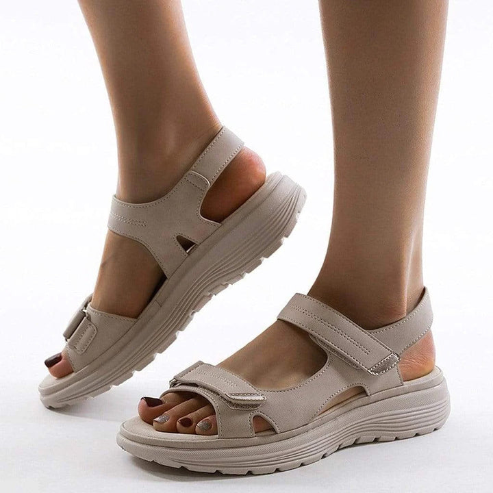 Adjustable women's orthopedic sandals with arch support for custom comfort and fit.
