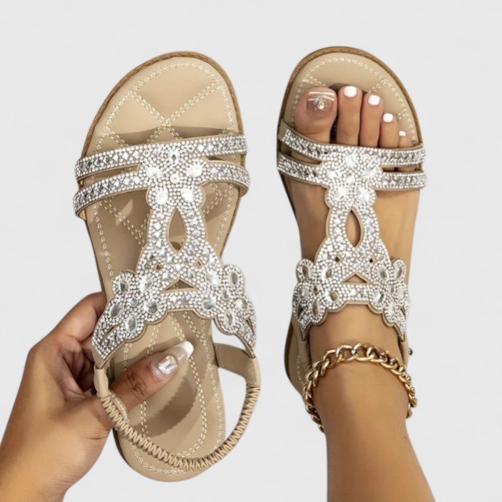 Side view of stylish women's comfort sandals, showcasing the supportive arch and durable outsole for walking.