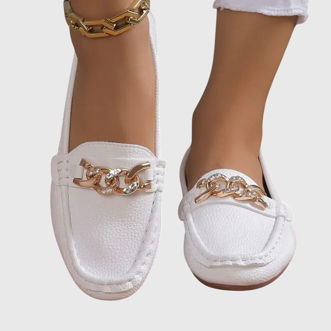Close-up of women's orthopedic loafers, emphasizing material texture & comfortable slip-on fit.
