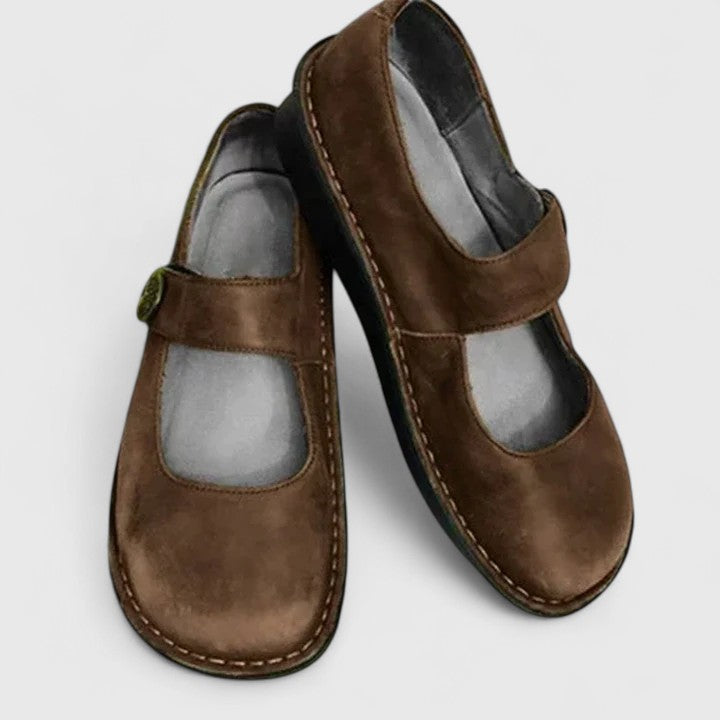 Black orthopedic Mary Jane shoes for women, providing therapeutic comfort & arch support.