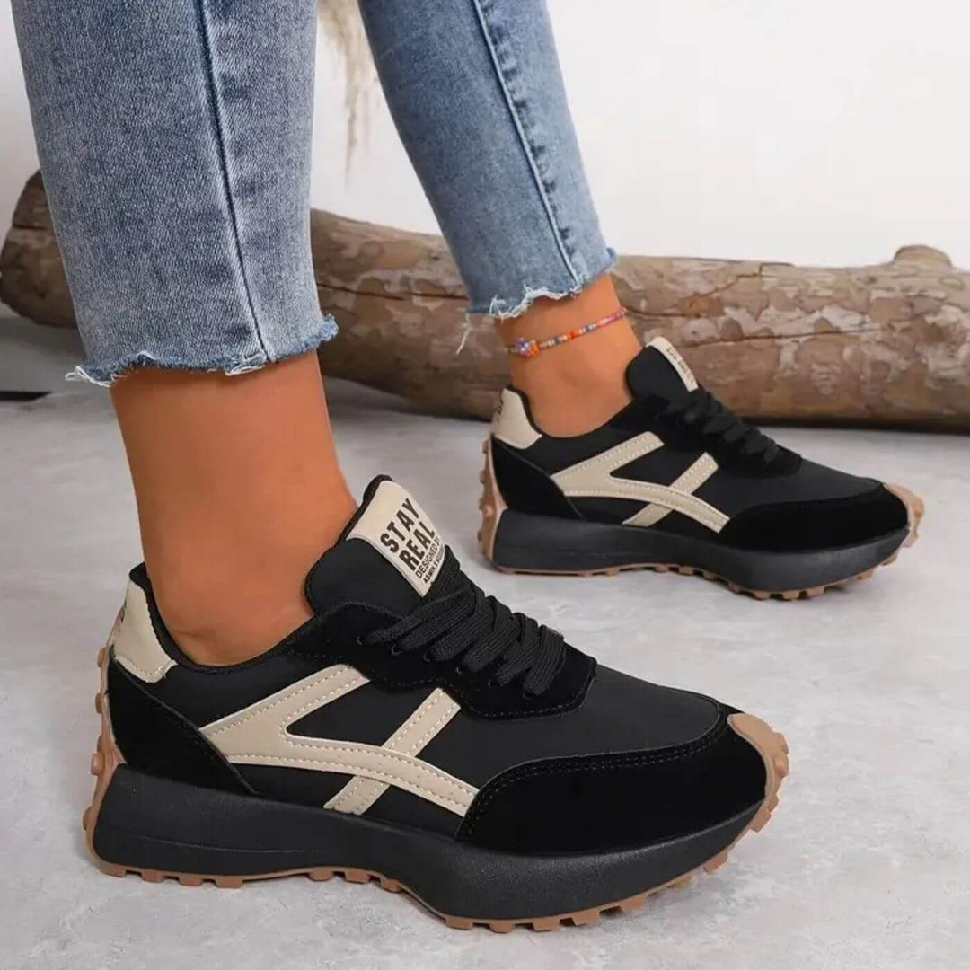 Women's orthopedic panel design sneakers, offering supportive comfort for all-day wear and walking.