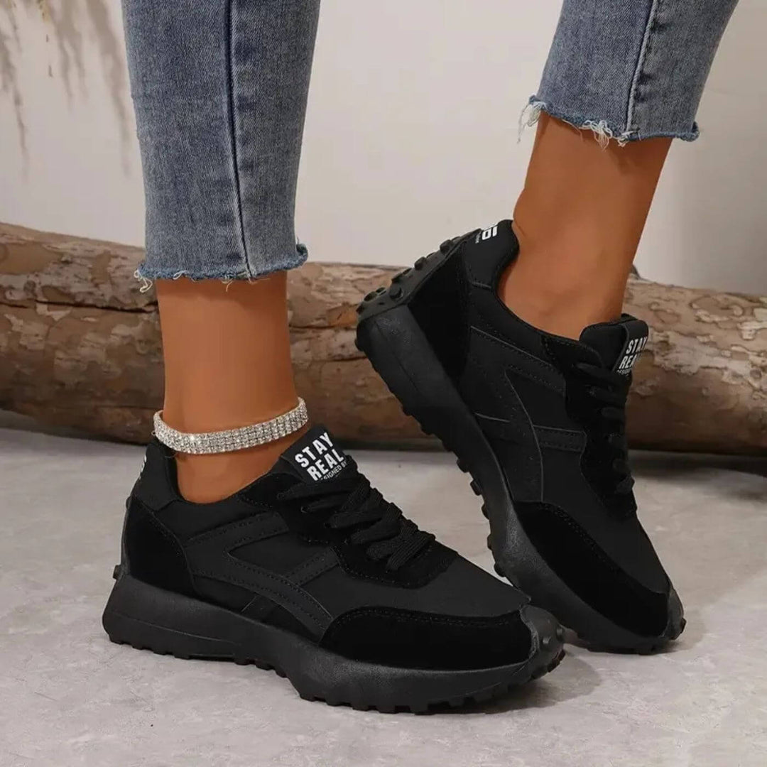 Comfortable women's casual sneakers with stylish panel design, perfect for everyday walking and support.