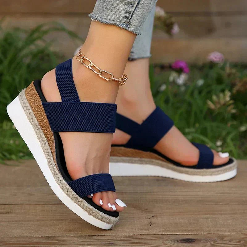 Side profile of women's comfortable platform sandals, showcasing orthopedic design, arch support & lightweight sole.
