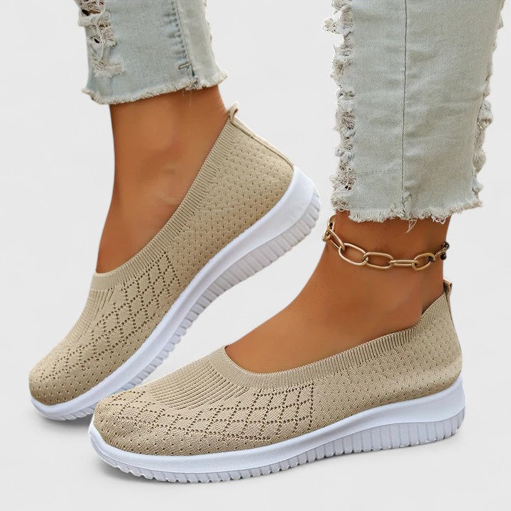 Flexible women's orthopedic slip-on shoes with arch support, providing ultimate comfort & easy wear.