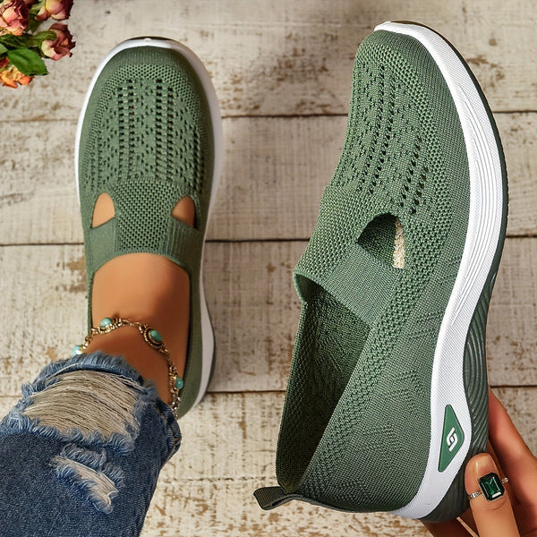 Front view of women's comfortable slip-on sneakers, featuring a breathable perforated design.