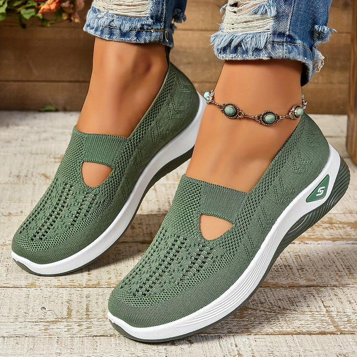 Comfortable women's slip-on walking shoes with arch support, ideal for daily wear.