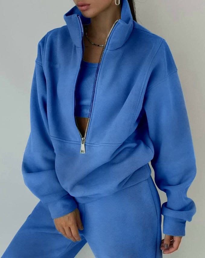 Comfortable women's half-zip oversized two-piece set, ideal for casual wear and relaxed style.