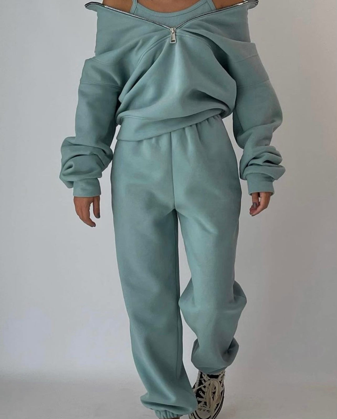 Soft women's casual two-piece set with oversized fit and half-zip detail, great for everyday comfort.