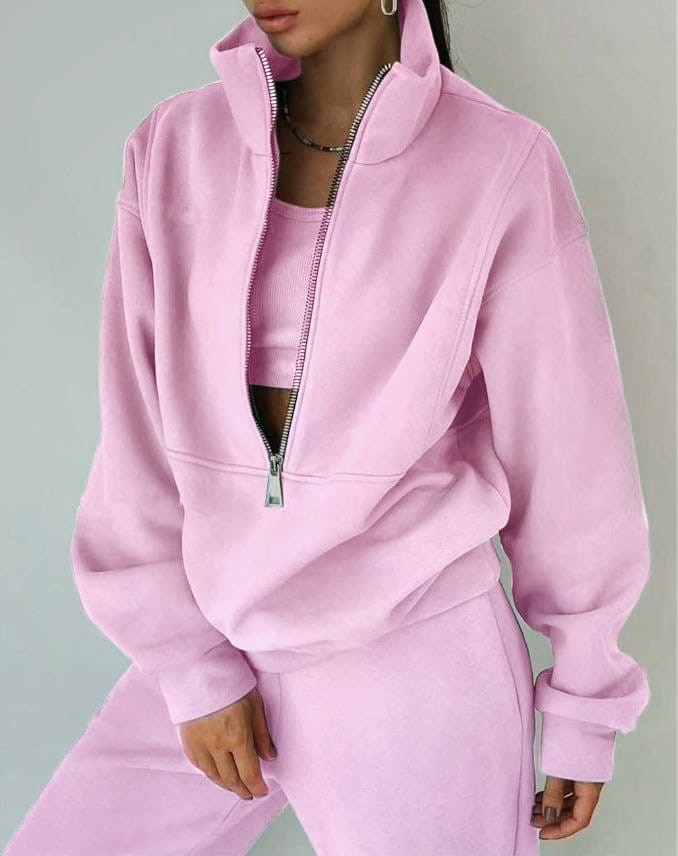 Relaxed women's loungewear two-piece set, featuring an oversized top & joggers for ultimate casual style.