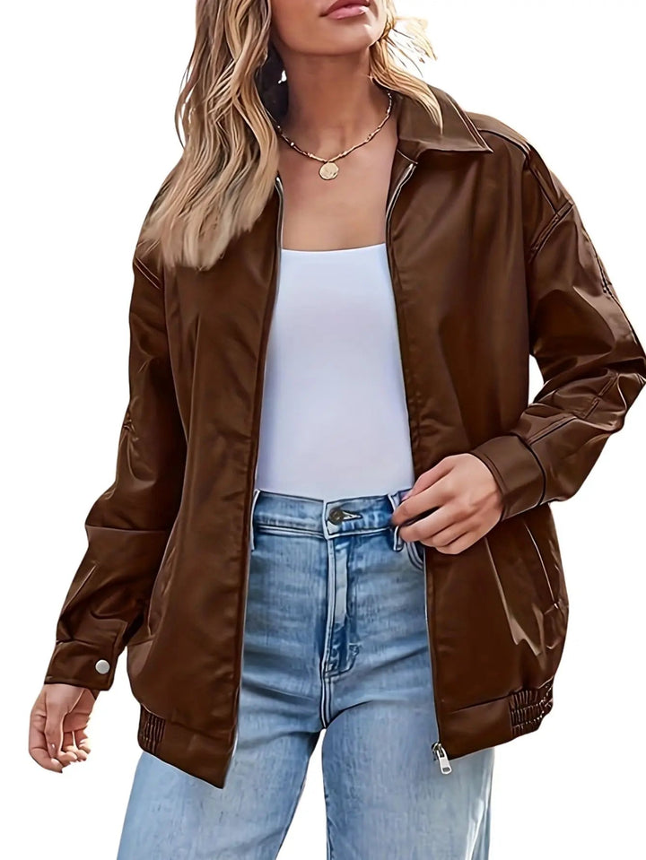Fashionable women's faux leather bomber, oversized and stylish outerwear