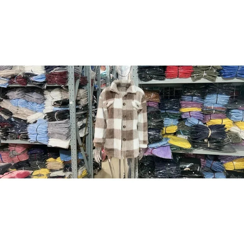 Relaxed fit women's oversized fleece plaid shacket, button-up and super cozy.