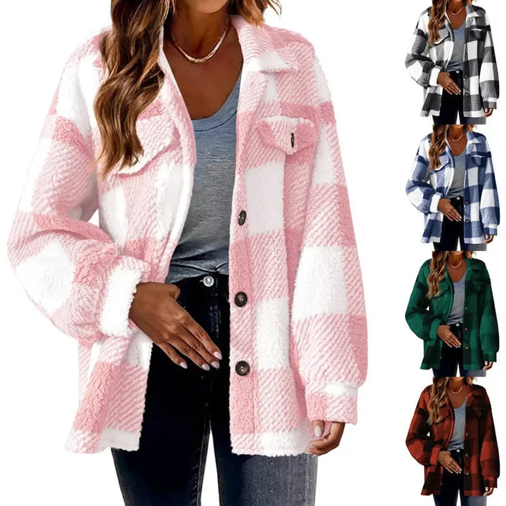 Women's cozy fleece plaid shacket, oversized button-up jacket for modern apparel.
