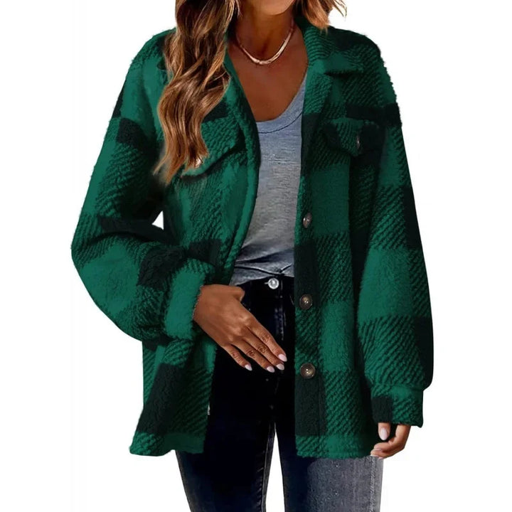 Classic women's plaid fleece shacket, oversized button-up for a cozy look.