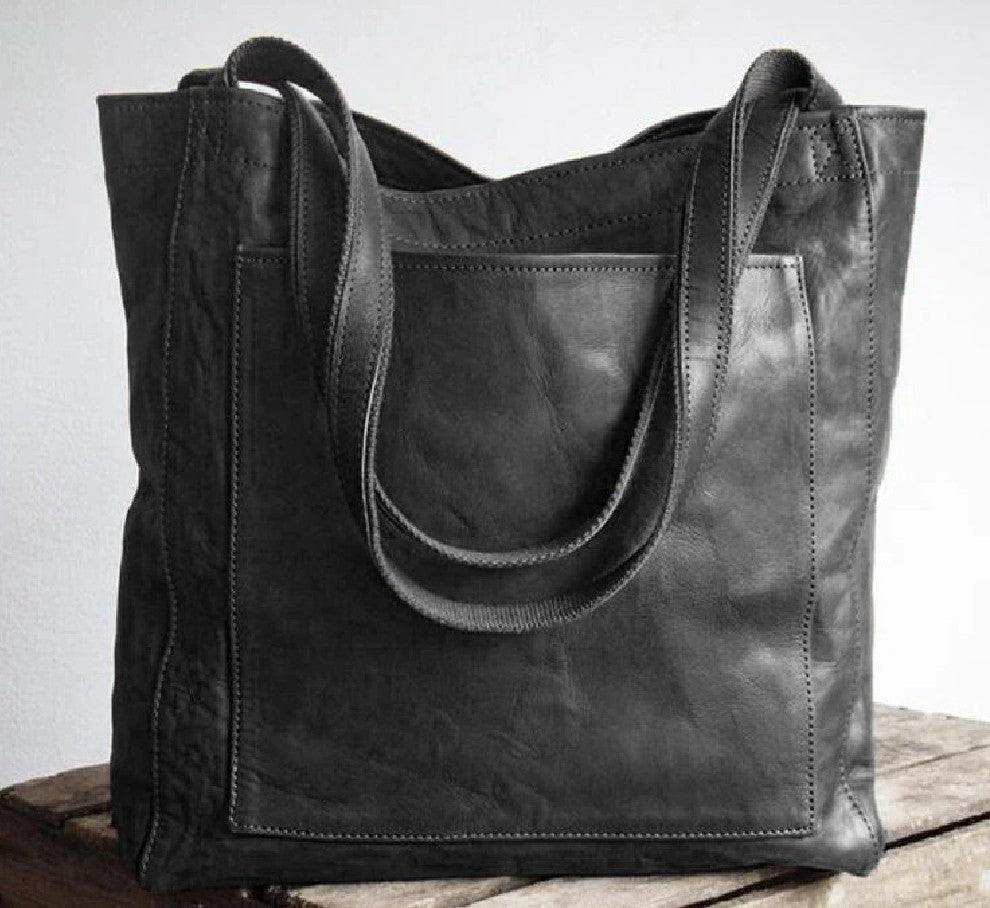 Stylish women's large capacity leather shoulder bag, ideal as an everyday fashion accessory.