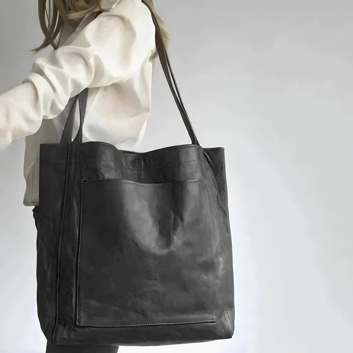 New arrival: Chic women's oversized leather tote with practical large pocket, a must-have fashion accessory.