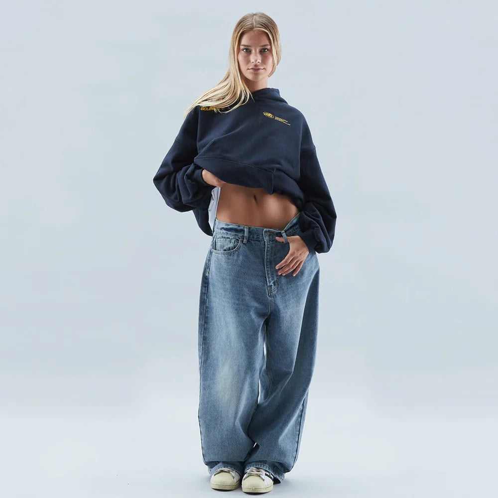 Comfortable women's oversized graphic pullover hoodie, ideal for casual wear and relaxed fashion.