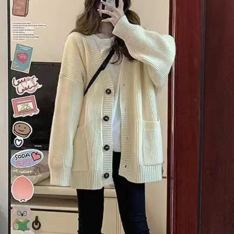 Fall fashion women's oversized knit cardigan, v-neck design with functional button-front