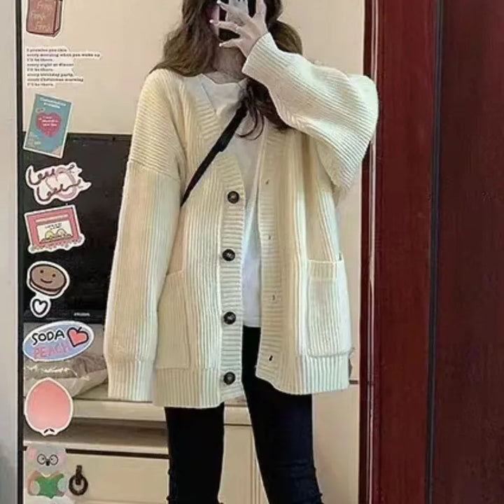 Fall fashion women's oversized knit cardigan, v-neck design with functional button-front