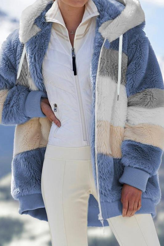 Warm oversized teddy jacket for women, featuring a stylish striped hood for cold weather comfort.