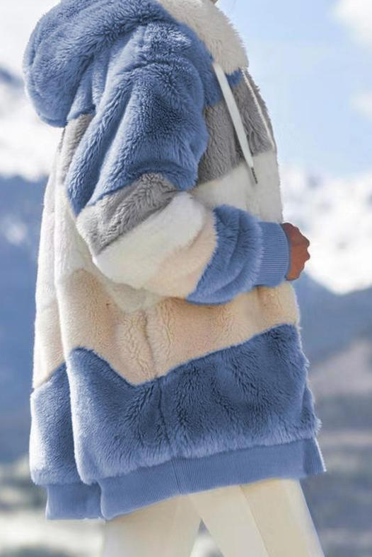 Stylish women's oversized teddy jacket with striped hood, ideal for winter outerwear and cold weather.