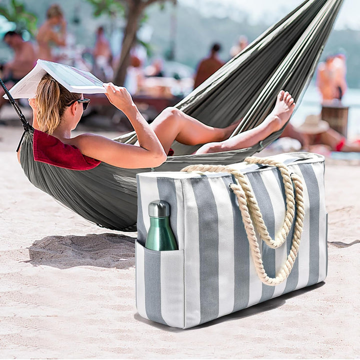 Spacious sandproof beach bag, easy to clean after sandy adventures.