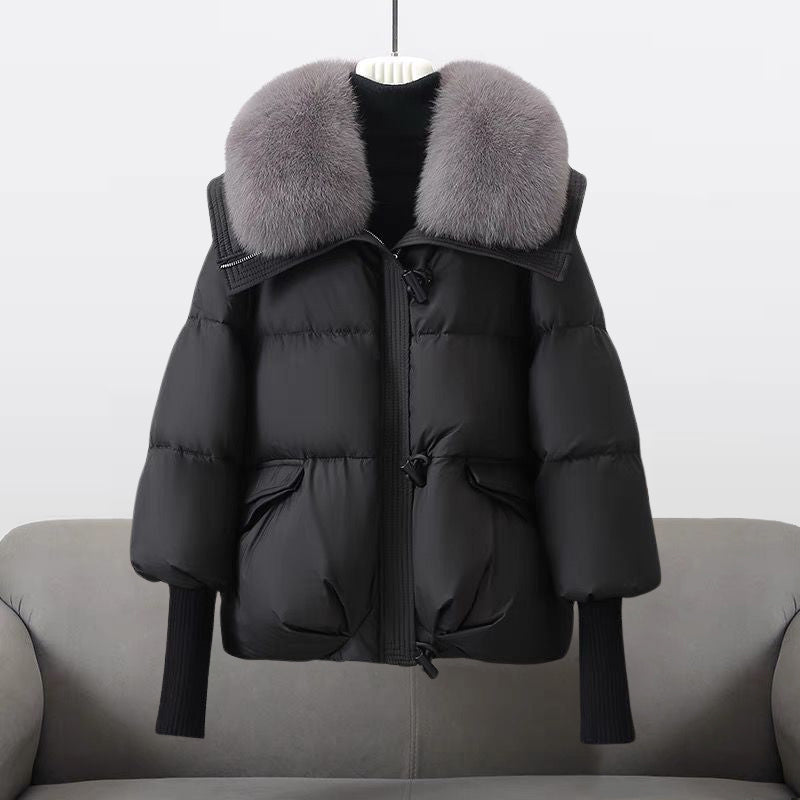 Women's padded warm winter jacket with a luxurious fur collar, ideal for cold weather