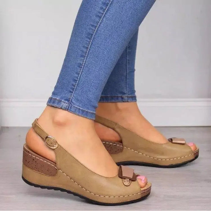 Stylish women's low wedge peep toe slingback sandals, perfect for chic and comfortable summer outfits.