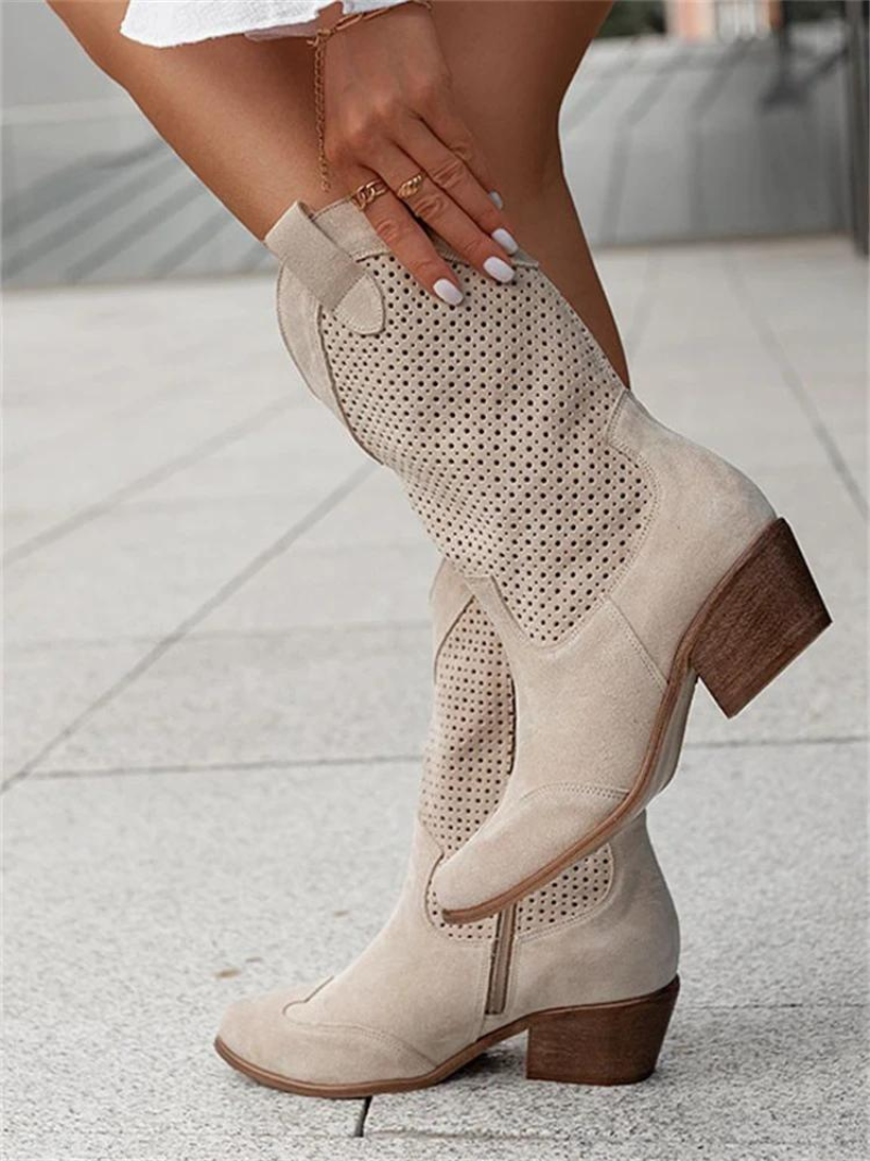 Comfortable women's perforated mid-calf boots. Trendy western cowgirl footwear with a stylish low heel design.