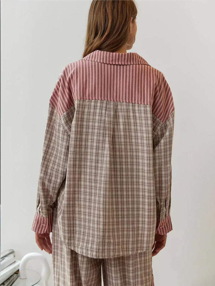 Close-up of women's pink and blue plaid fabric, detailing the two-piece set's spring casual design