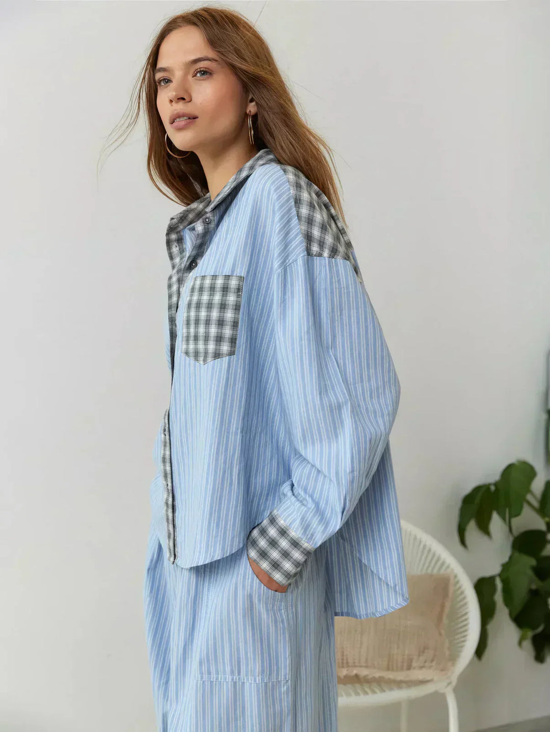 Women's matching pink and blue plaid shorts, completing a fashionable two-piece set for spring outfits
