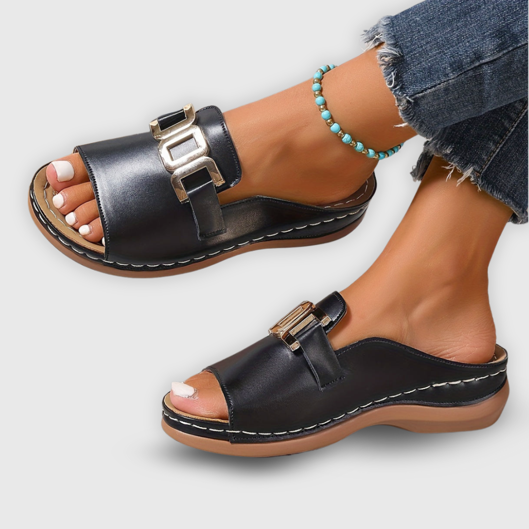 Top-down view of multi-colored women's platform slip-on sandals. Trendy spring and casual footwear.