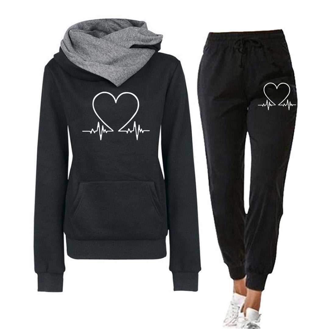 Women's pink relaxed fit tracksuit with heart graphic, comfortable loungewear set