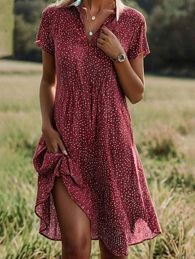 Stylish women's polka dot summer dress, available in green, red, or blue. Casual, comfortable & versatile A-line V-neck.