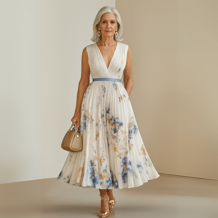 Versatile women's pleated sleeveless maxi dress for summer. Wear casually, for vacation or elegant occasions.