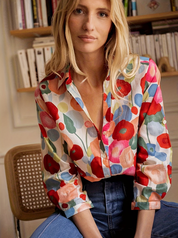 Elegant women's Poppy Bold Floral collared button-down shirt. Versatile long sleeve blouse for summer.